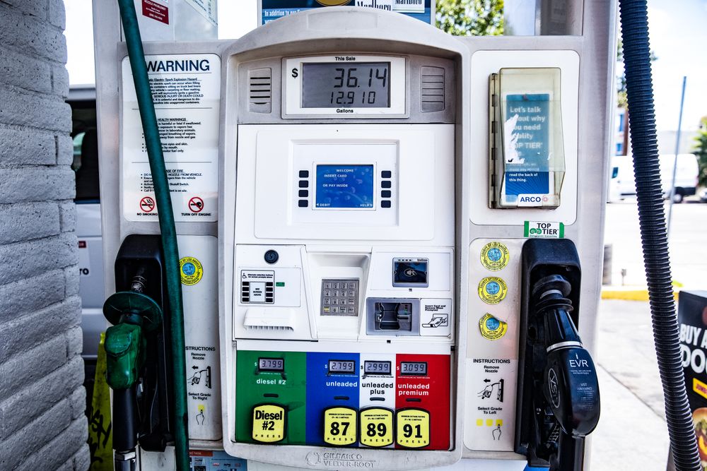 Close-up of a fuel pump showing gasoline and diesel options at a gas station in Los Angeles.